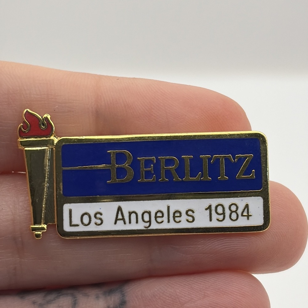 1984 Los Angeles Olympics Berlitz Sponsor Olympic Torch Lapel Hat Pin‎